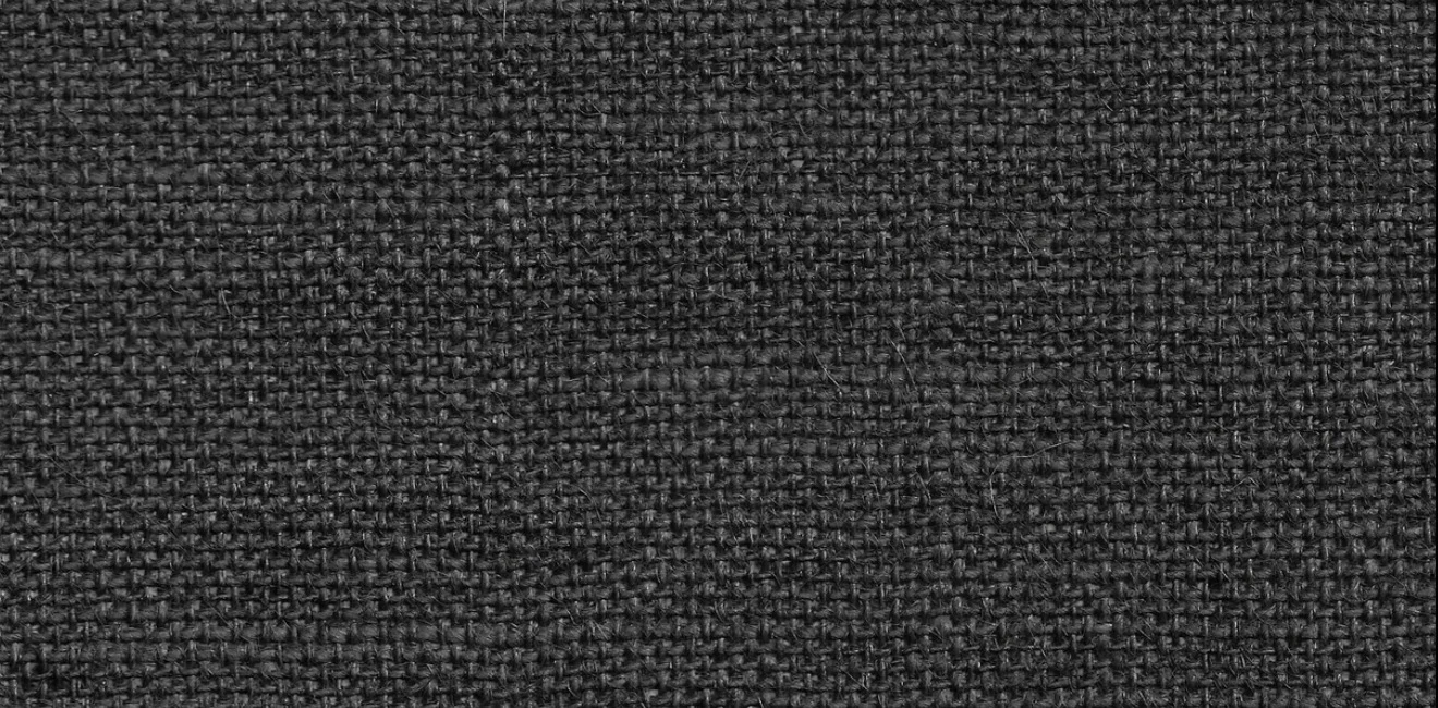 Close-up of a charcoal-black jute wallcovering with a pronounced basket weave and soft fibre texture