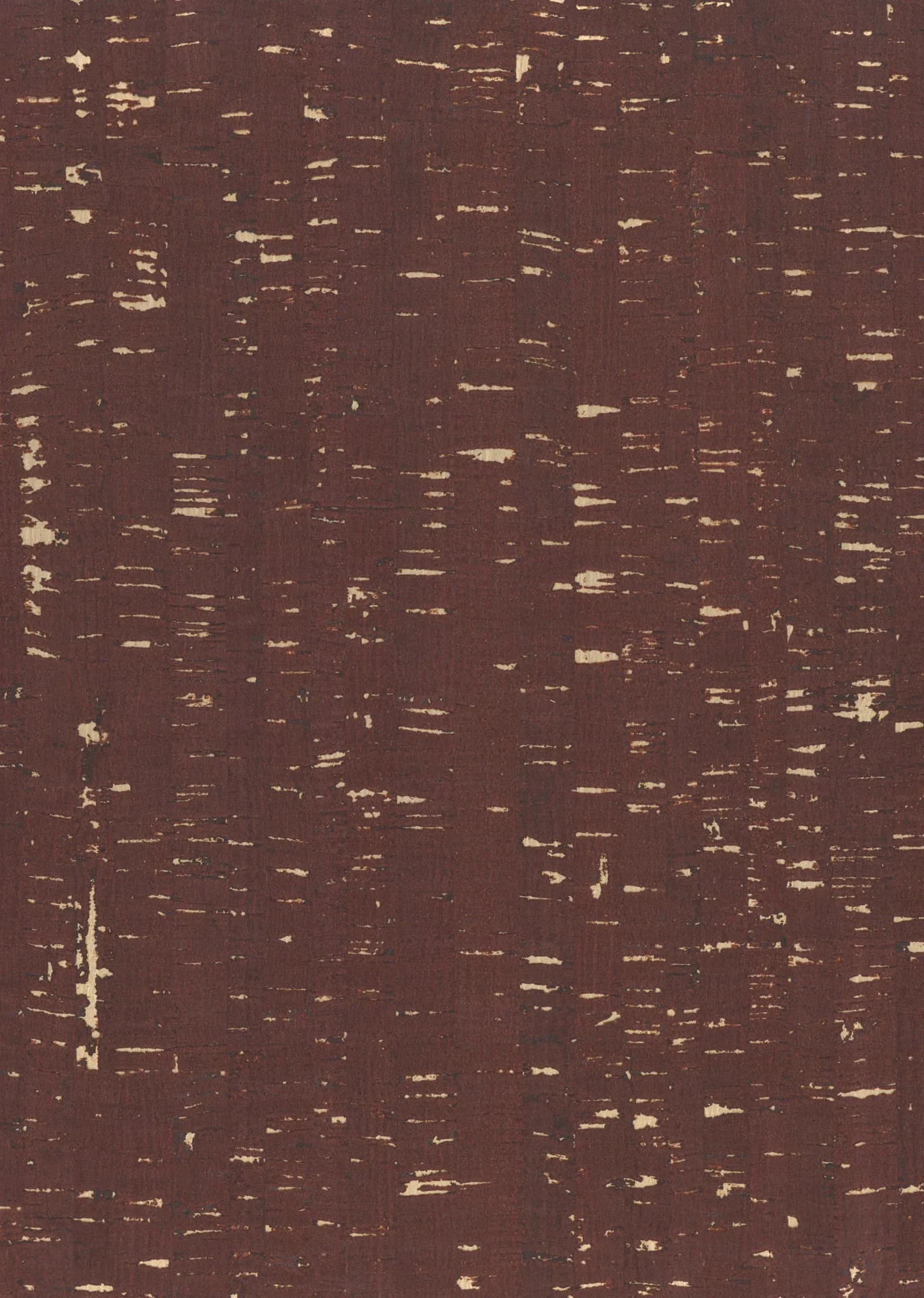 Close-up of a deep brown cork wallcovering with scattered pale natural cork flecks