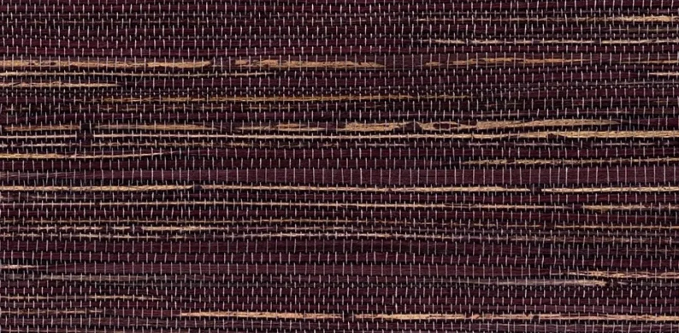 Close-up of a deep plum hemp wallcovering with fine pale binding threads and irregular golden fibre strands