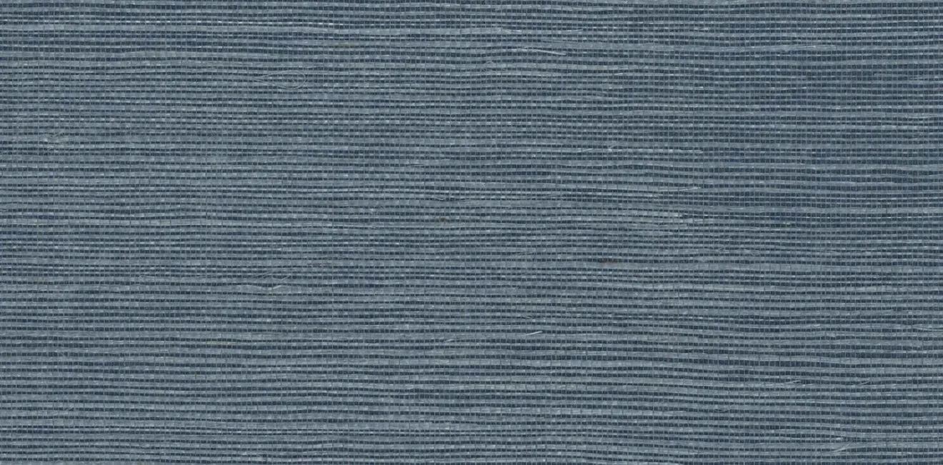 Close-up of a slate-blue sisal wallcovering showing its fine horizontal weave and occasional loose natural fibres