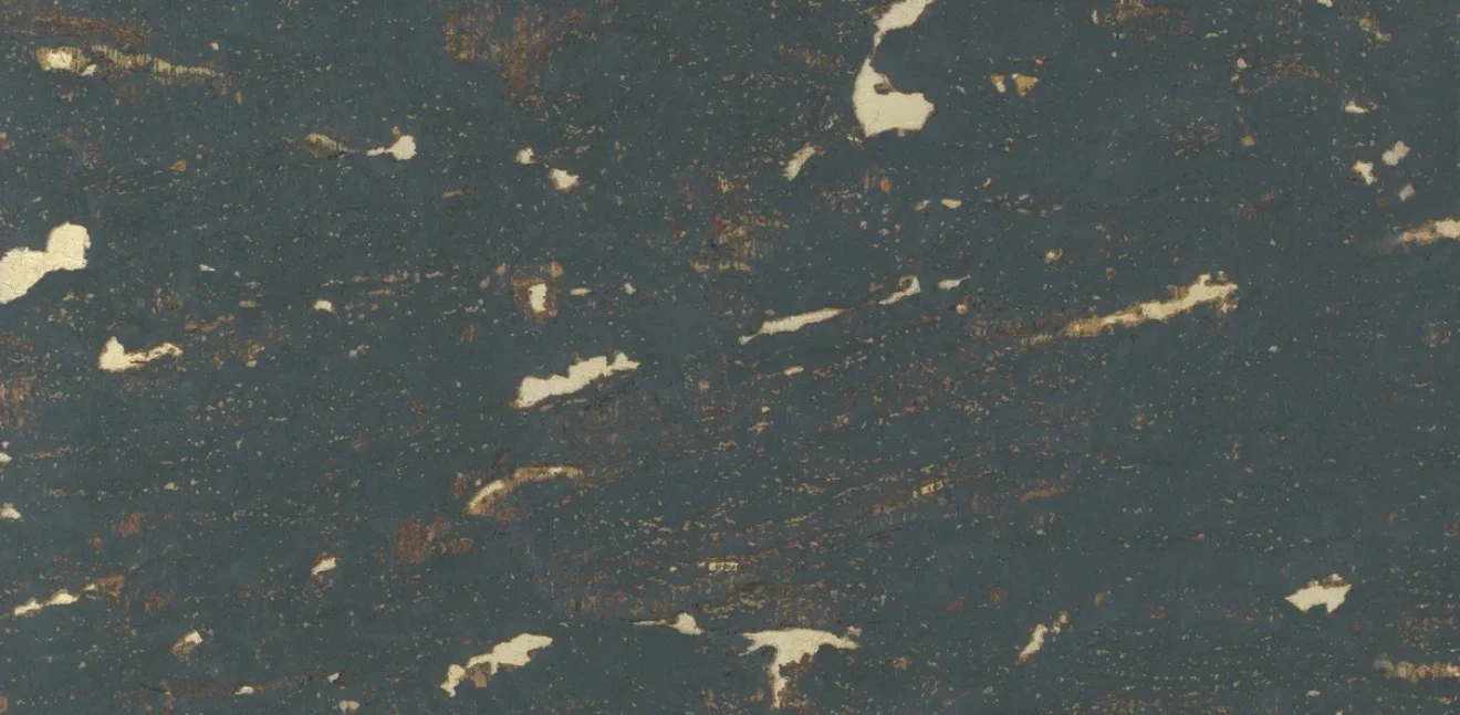 Close-up of a deep teal cork wallcovering with pale gold-toned natural cork markings and fine russet flecks