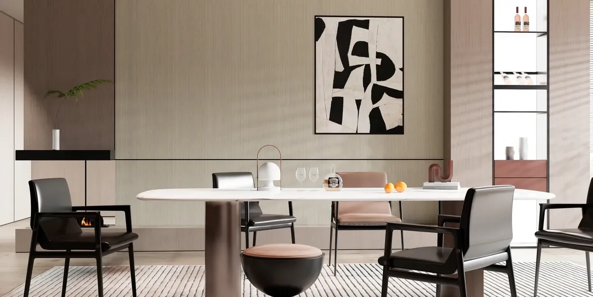 Contemporary dining room with a pale linear wood-grain wall behind a white stone table, dark leather chairs and an abstract black and white artwork