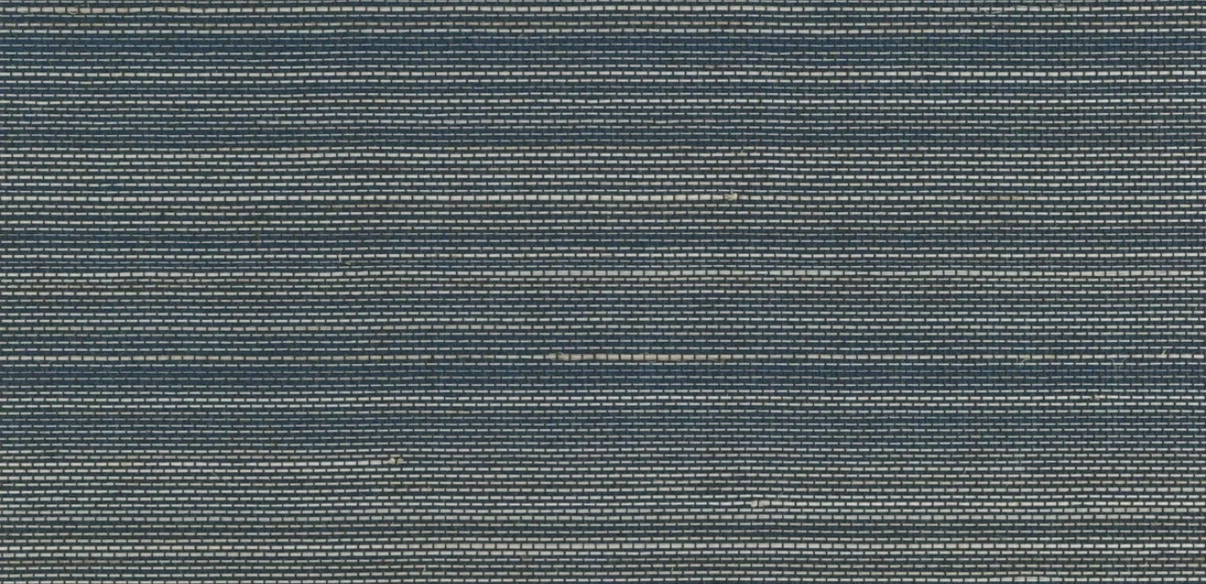 Close-up of a navy and grey abaca wallcovering with a tight, rhythmic woven structure