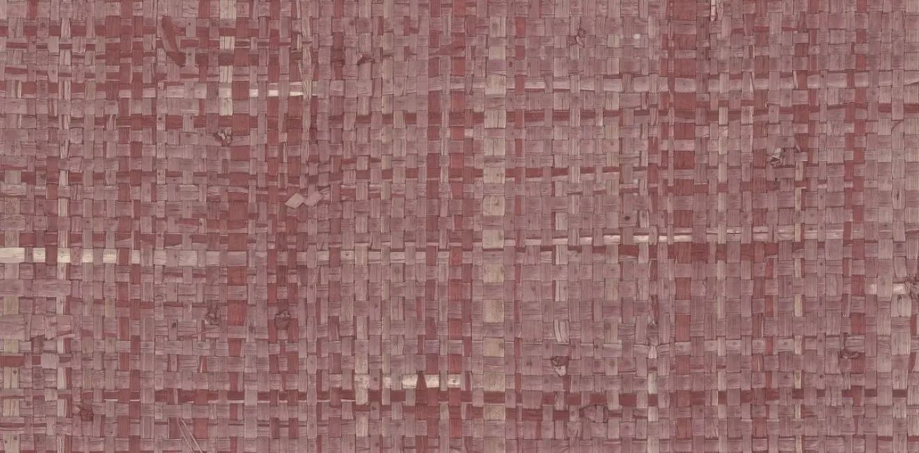 Close-up of a dusty red raffia wallcovering showing its intersecting woven fibres and small knots